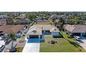 Bird's-eye view of a single-story house with a large backyard and surrounding homes at 9363 Steubenville Ave, Englewood, FL 34224