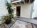 Condo building exterior with walkway and landscaping at 4445 46Th W Ave, Bradenton, FL 34210