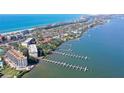 Aerial view showcasing a condo building near the water at 8625 Midnight Pass Rd # 505B, Sarasota, FL 34242