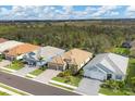 Aerial view of a neighborhood with houses of similar style at 13325 Indigo Way, Bradenton, FL 34211