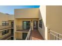 Condo building exterior showcasing entrance and balcony at 6440 Mourning Dove Dr # 403, Bradenton, FL 34210