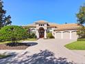 Two story house with three car garage at 7123 Beechmont Ter, Lakewood Ranch, FL 34202