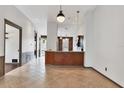 Kitchen features granite countertops and dark wood cabinets at 5581 Key West Pl # 5581, Bradenton, FL 34203