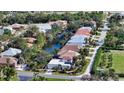 Bird's-eye view of the property near canal, showcasing its location at 2402 Palmetto St, Nokomis, FL 34275