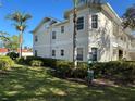 Side view of condo building showcasing building features and landscaping at 3701 54Th W Dr # 104, Bradenton, FL 34210