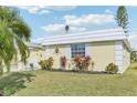 Ranch-style home with attractive landscaping and curb appeal at 5891 Tidewood Ave # 1, Sarasota, FL 34231