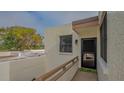 Private balcony access with door and hello mat at 119 Tidewater Dr # 119, Bradenton, FL 34210