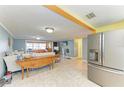 Modern kitchen with stainless steel appliances and granite countertops at 3029 Homasassa Rd, Sarasota, FL 34239