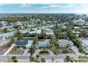 Aerial view of home and neighborhood, showcasing the property's location and surroundings at 219 Periwinkle Plz, Anna Maria, FL 34216