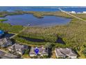 Aerial view showcasing condo location near water at 636 Estuary Dr # 636, Bradenton, FL 34209