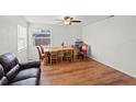 Light-filled dining area featuring hardwood floors and a casual dining setting at 2343 Prospect St, Sarasota, FL 34239