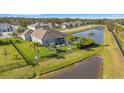 Backyard oasis with private pool, screened lanai, and lush landscaping at 15808 42Nd E Gln, Parrish, FL 34219