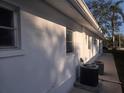 Side view of the house showcasing the AC units at 4514 103Rd W St, Bradenton, FL 34210