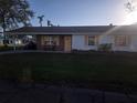 Front view of a ranch home with a carport and lawn at 4514 103Rd W St, Bradenton, FL 34210