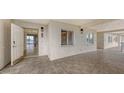 Building hallway with entrance to condo unit at 4825 Gulf Of Mexico Dr # 304, Longboat Key, FL 34228