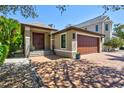 Attractive two-car garage and front entry at 2139 Hawthorne St, Sarasota, FL 34239