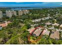 Aerial view showcasing a home's location in a community with water access at 293 Turquoise Ln, Osprey, FL 34229