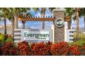 Evergreen Estates community entrance sign with landscaping at 3668 Turning Tides Ter, Bradenton, FL 34208