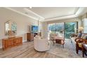 Spacious living room with hardwood floors and lots of natural light at 5846 Cavano Dr, Sarasota, FL 34231