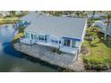 Waterfront home with private deck and beautiful landscaping at 1005 Ibis Ct, Bradenton, FL 34209
