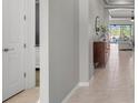 Bright and airy entryway with tile flooring and modern decor at 11550 Blackfin St, Venice, FL 34292