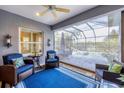 Relaxing screened lanai overlooking a refreshing pool and patio area at 12117 Whisper Lake Dr, Bradenton, FL 34211