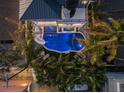Aerial view showcasing the home's pool, landscaping, and location at 150 Grant Dr, Sarasota, FL 34236