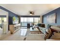 Living room features water views, comfy seating and tiled floors at 1510 1St W Ave # 504, Bradenton, FL 34205