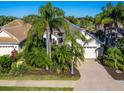 Property view showcasing home's curb appeal and surrounding neighborhood at 7131 Sandhills Pl, Lakewood Ranch, FL 34202