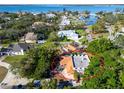 Aerial perspective showcasing a single-story house nestled among other homes at 7705 Alhambra Dr, Bradenton, FL 34209