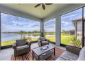 Relaxing screened porch overlooking a lake at 8918 Barrier Coast Trl, Parrish, FL 34219