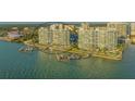 Aerial view of luxury waterfront condos with boat slips at 988 Blvd Of The Arts # 311, Sarasota, FL 34236