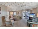 Spacious living room with access to covered patio at 1523 46Th E Ave, Ellenton, FL 34222