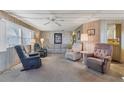 Living room with two armchairs and a sofa at 1523 46Th E Ave, Ellenton, FL 34222