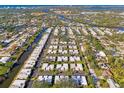 Wide aerial view of waterfront community at 2505 Riverbluff Pkwy # V196, Sarasota, FL 34231
