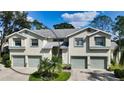 Two-story condo building with attached garages at 5507 Fair Oaks St # 3-C, Bradenton, FL 34203