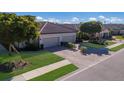 Two-story homes with tile roofs in a community setting at 8224 Varenna Dr, Sarasota, FL 34231