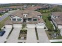 Luxury townhome community with three-car garages, and meticulously landscaped grounds at 17607 Gawthrop Dr # 103, Bradenton, FL 34211