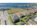 Aerial view of waterfront community with large empty lot at 1810 5Th E St, Palmetto, FL 34221