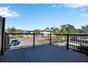 Private balcony with composite decking and metal railings at 3212 Ramblewood N Dr # 3212, Sarasota, FL 34237