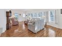 Bright living room featuring hardwood floors and ample natural light at 4316 12Th Street E Ct, Ellenton, FL 34222