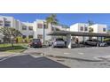 Covered parking area for condo residents, offering shade and protection at 5152 Marsh Field Ln # 117, Sarasota, FL 34235