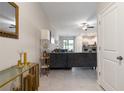 Bright living room with open floor plan and stylish decor at 14350 Easy Goer St, Ruskin, FL 33573