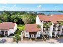 Aerial view of condo community near the water at 1626 Stickney Point Rd # 26-102, Sarasota, FL 34231