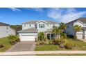 Two-story house with a landscaped yard and driveway at 3431 Chestertown Loop, Bradenton, FL 34211