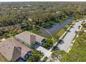 Aerial view of house showcasing a waterfront location and neighborhood context at 5213 Asher Ct, Sarasota, FL 34232