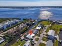 Aerial view showcasing home's location on a canal with waterfront access at 524 Palm Ave, Ellenton, FL 34222