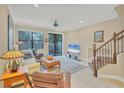 Spacious living room with hardwood floors and a view of the backyard at 204 Crew Ct, Sarasota, FL 34243