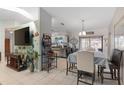 Bright dining area with table and chairs, adjacent to kitchen at 339 Rio De Janeiro Ave, Punta Gorda, FL 33983
