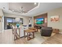Spacious living room with large sectional sofa and flat-screen TV at 4534 Trento Pl, Bradenton, FL 34211